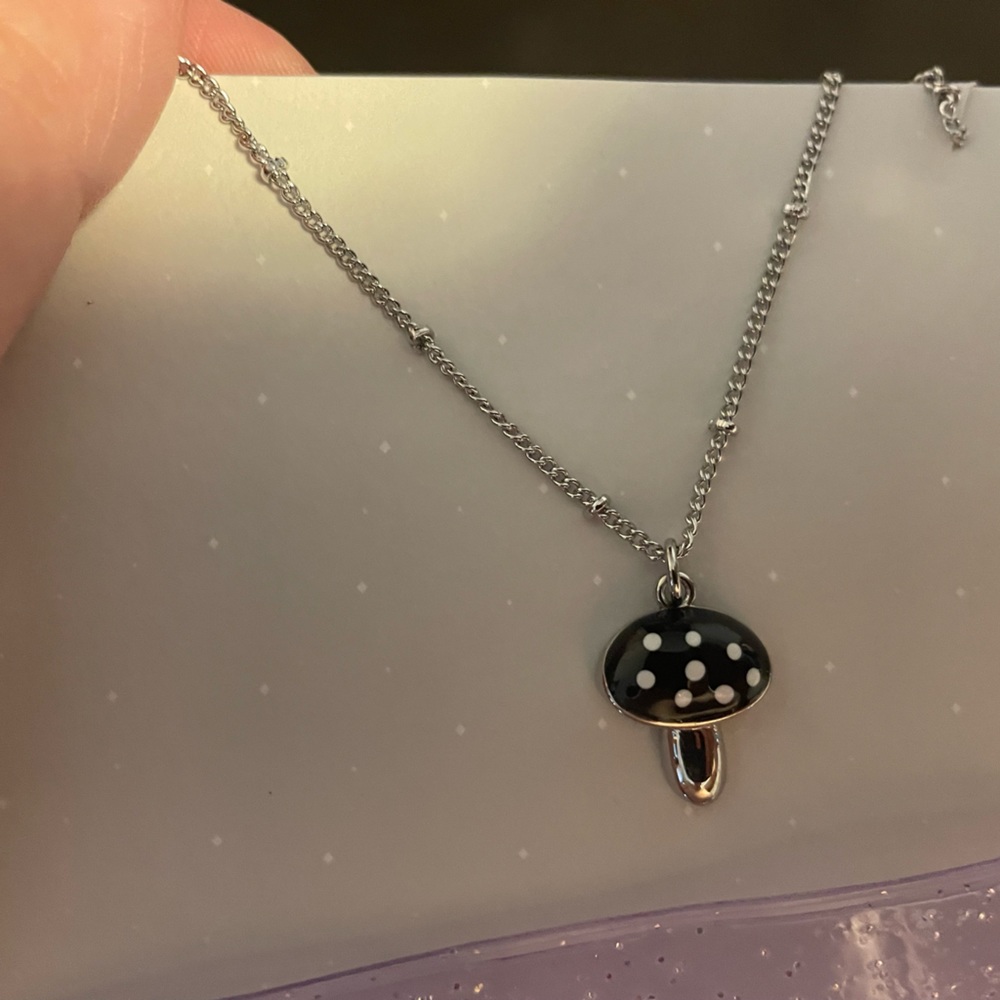 Black fun guy necklace